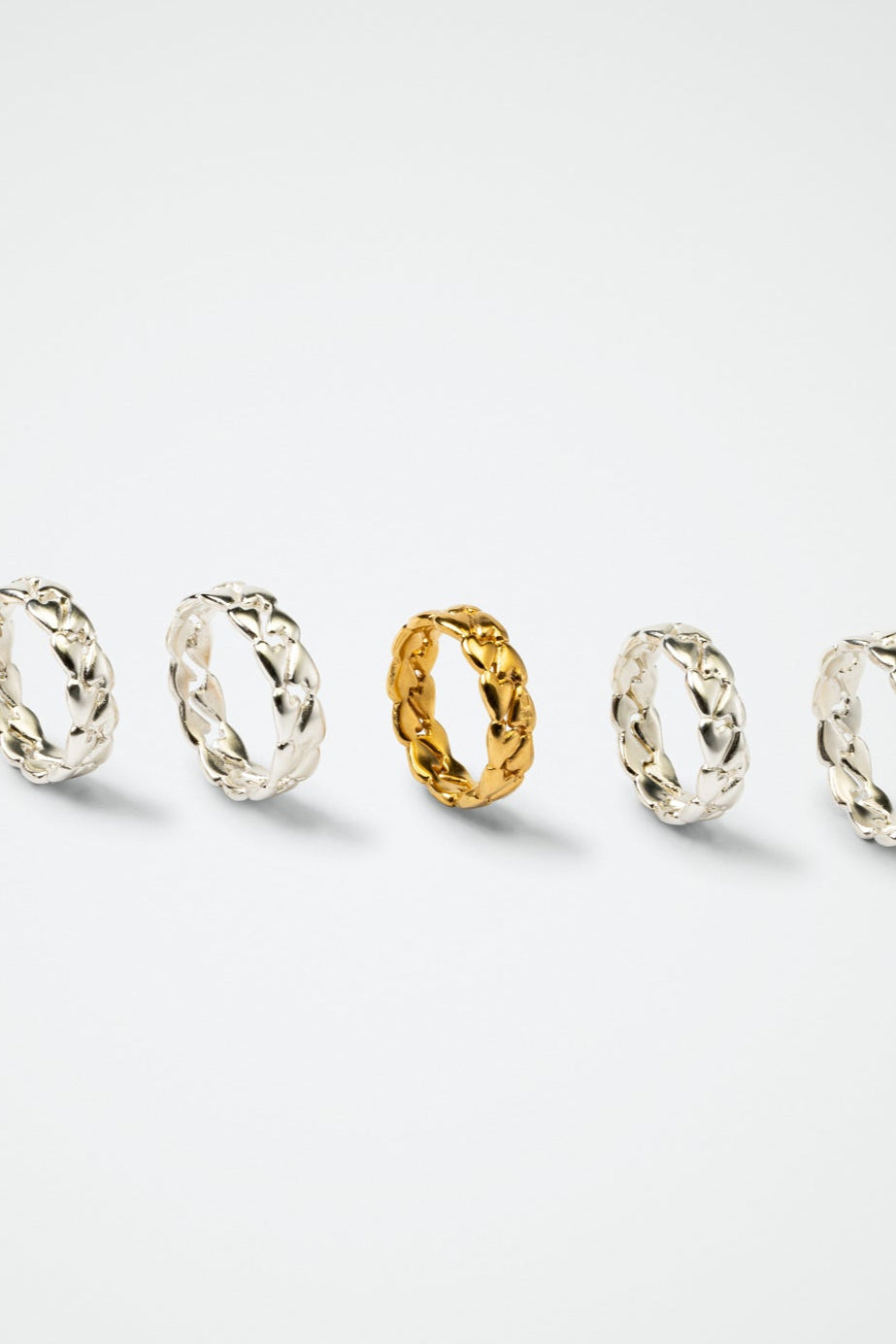Ring with tiny hearts gold and silver